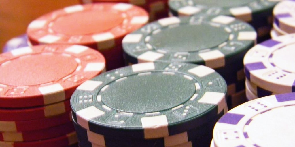 The image shows stacks of casino chips